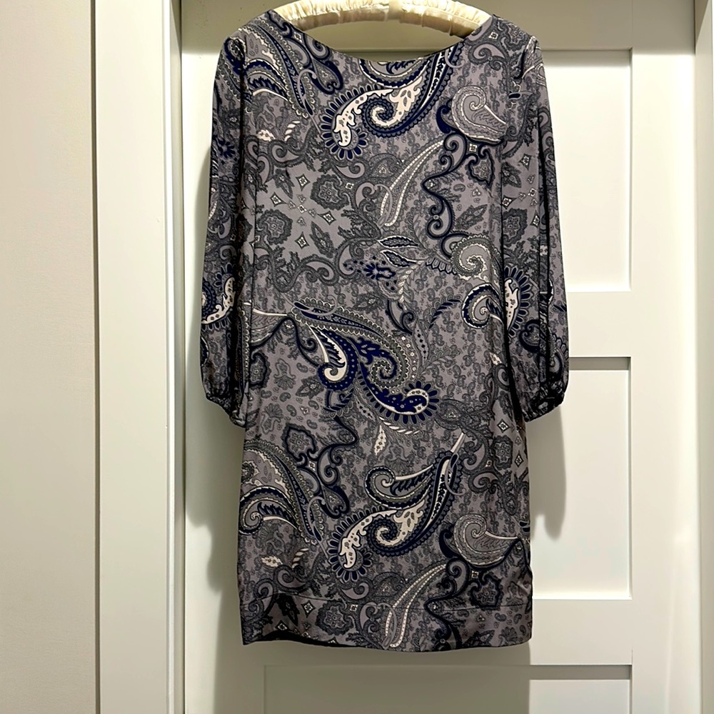 100% silk tunic dress. Pull over style. Very flattering!